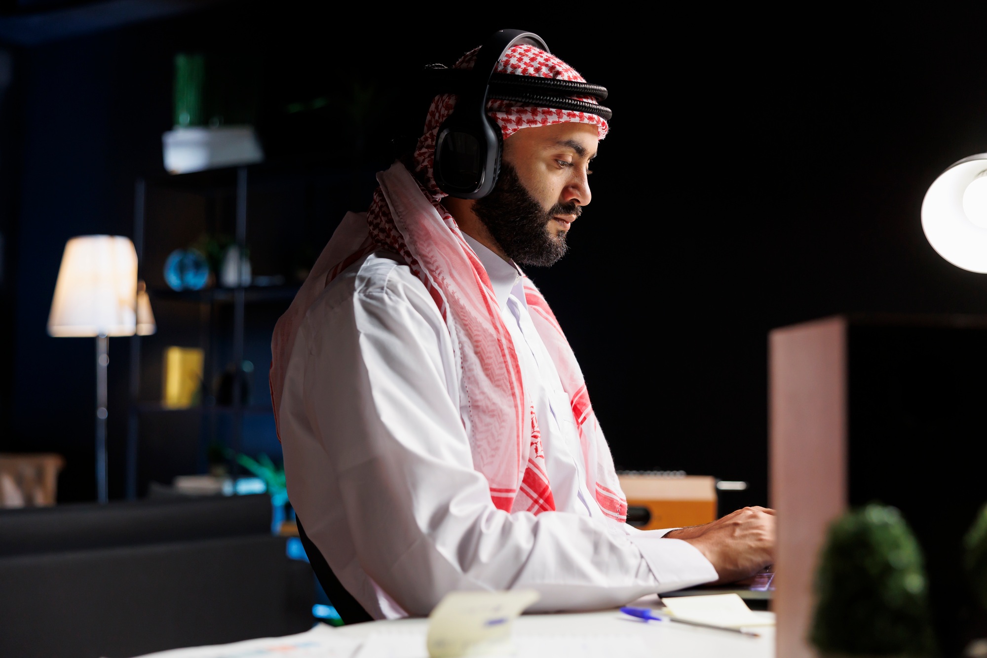 Arabian man utilizing wireless technology